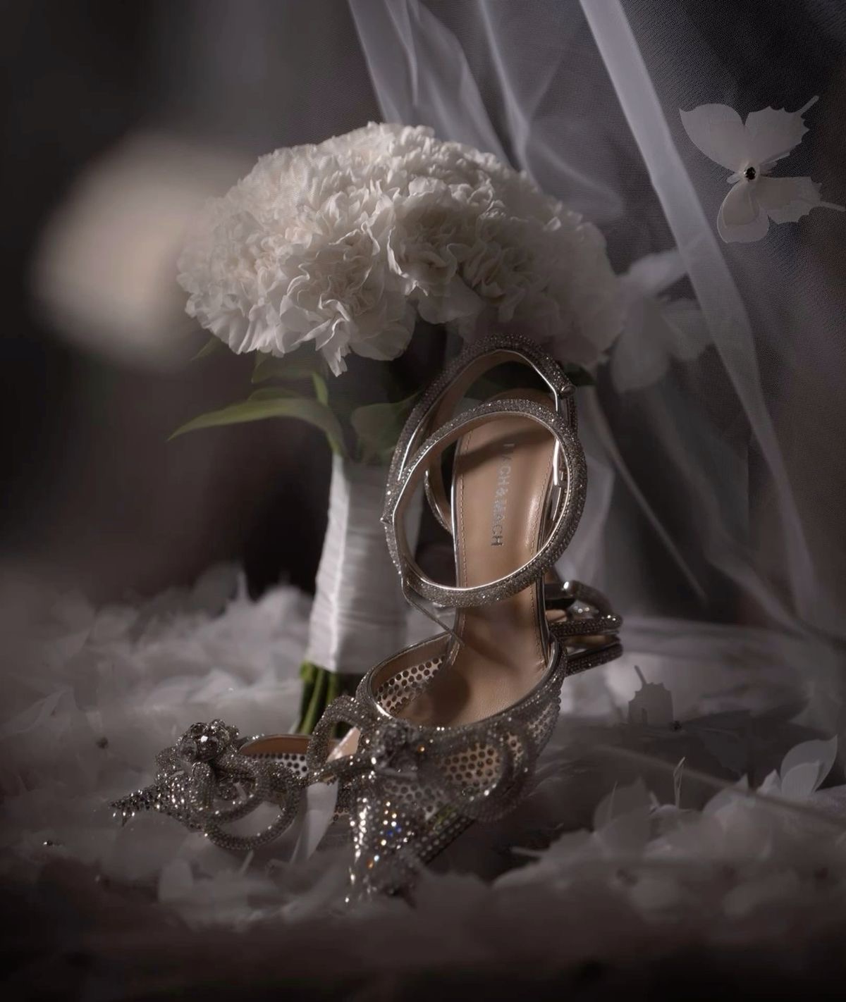 Bridal shoes and bouquet by Opulent Soirée Studio Designs